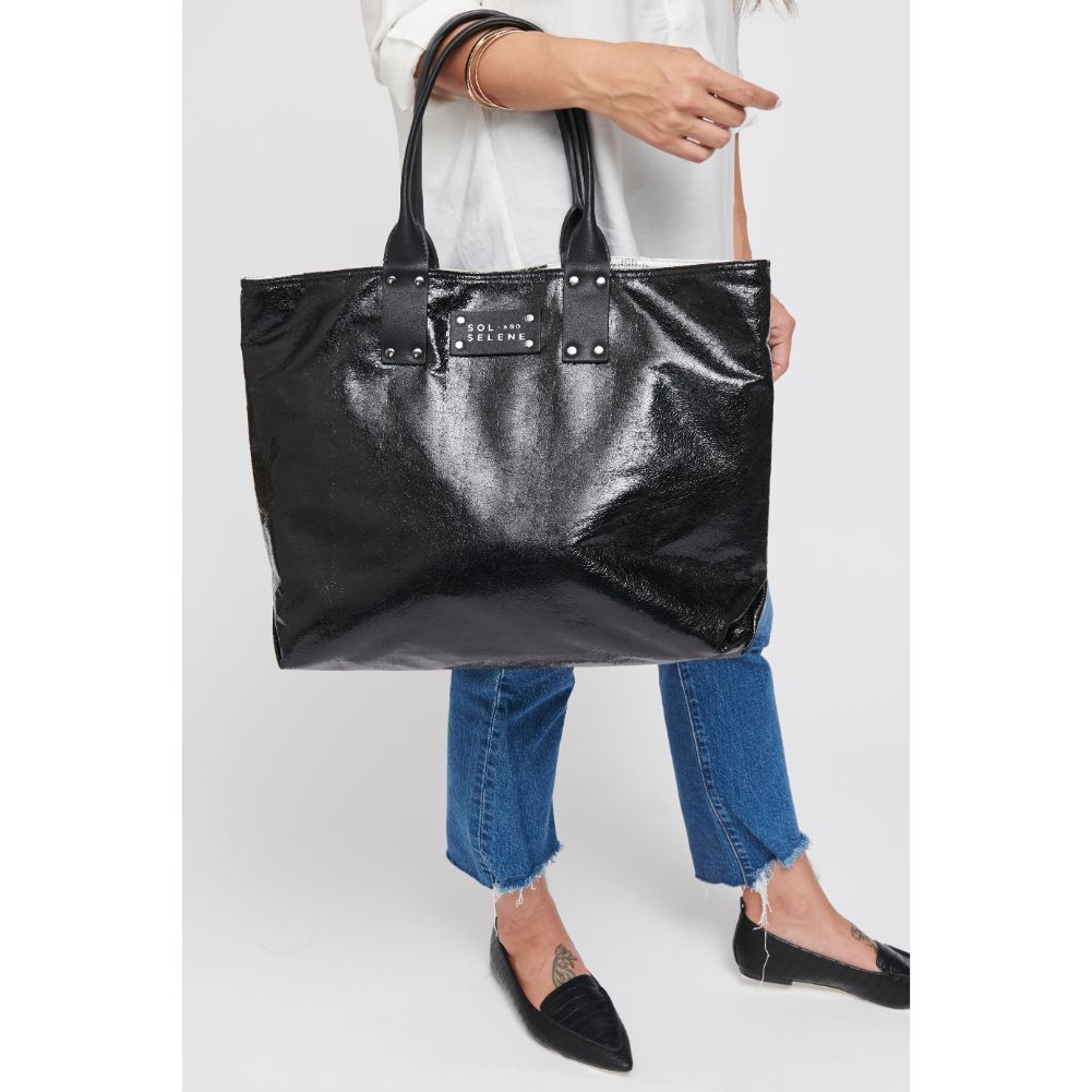 Woman wearing Black Metallic Sol and Selene It Girl Tote 841764105071 View 1 | Black Metallic
