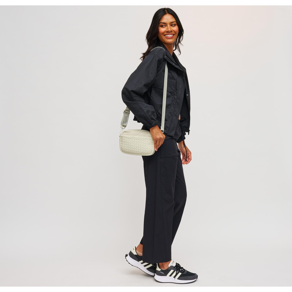 Woman wearing Bone Sol and Selene Inspiration - Woven Neoprene Crossbody 841764109215 View 3 | Bone