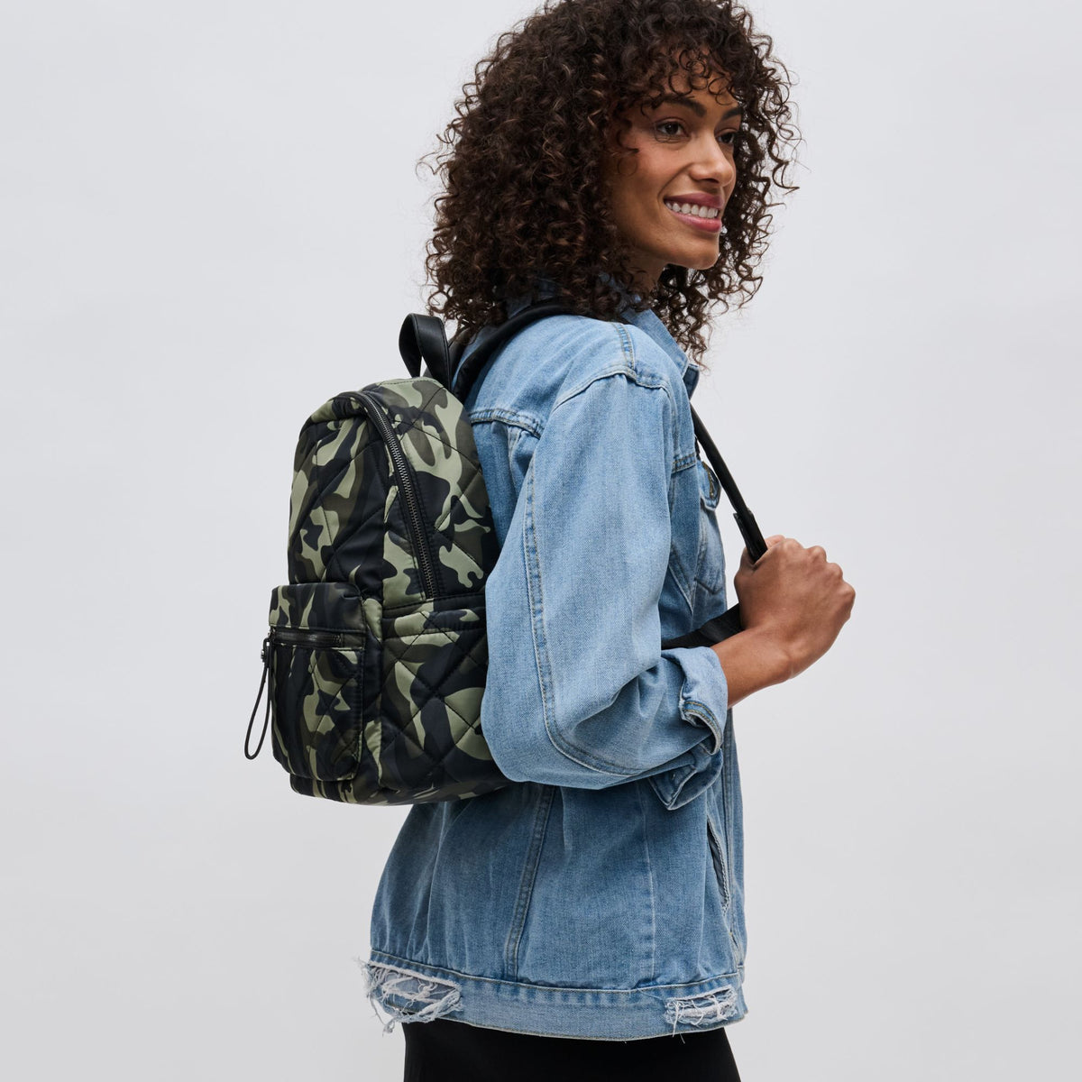 Woman wearing Camo Sol and Selene Motivator - Small Backpack 841764104128 View 2 | Camo