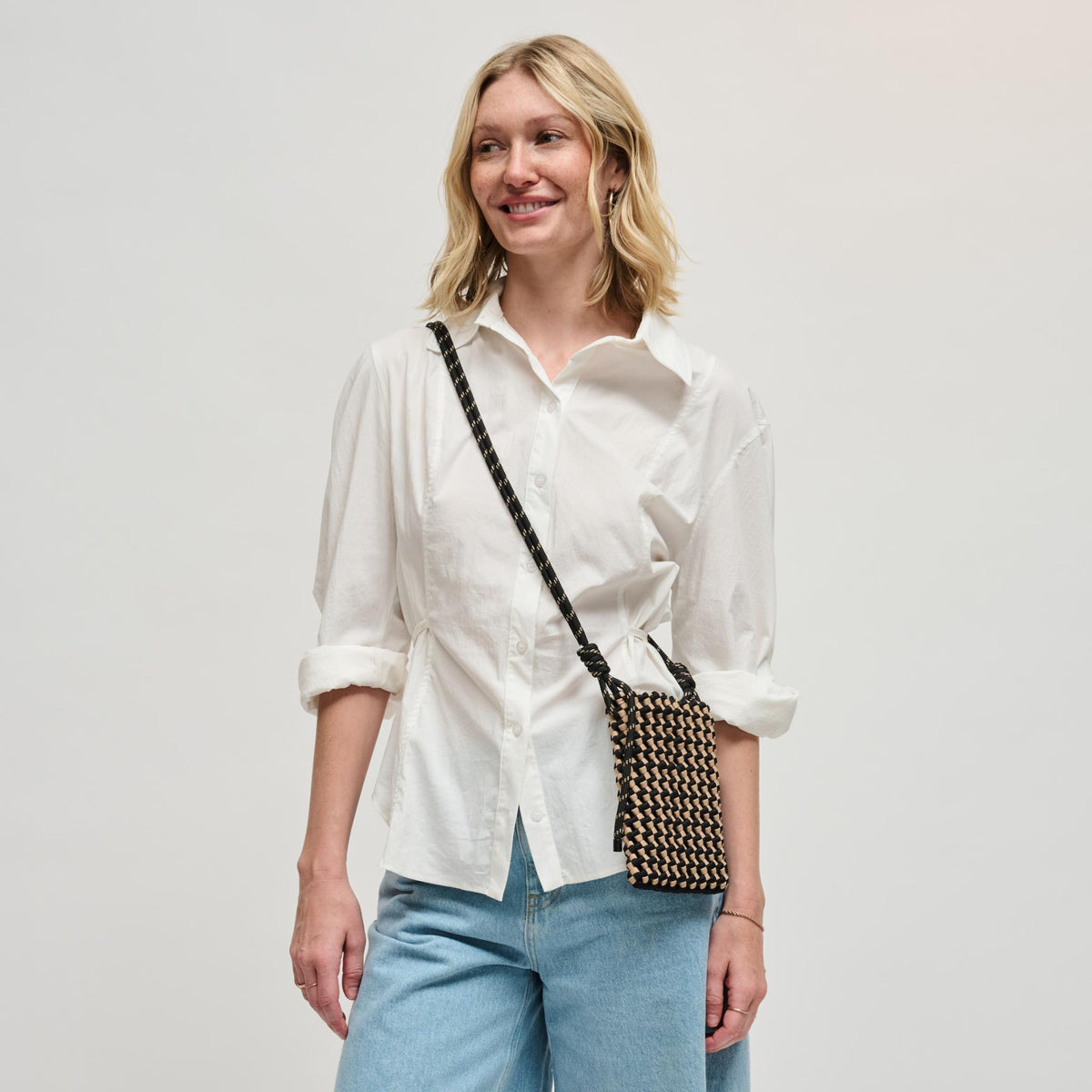 Woman wearing Black Nude Sol and Selene Eos Cell Phone Crossbody 841764113069 View 2 | Black Nude