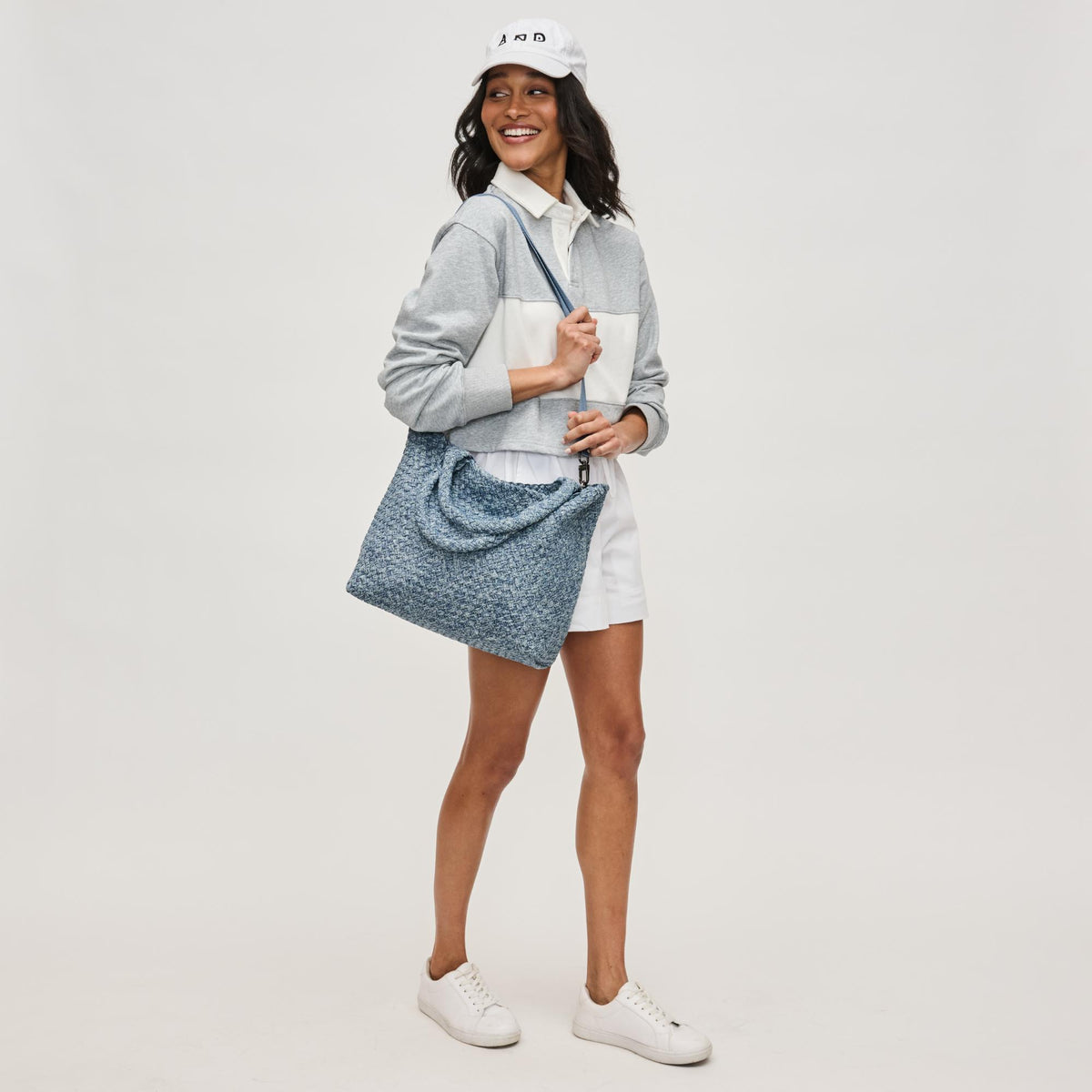 Woman wearing Denim Sol and Selene Sky's The Limit - Medium Denim Tote 841764111294 View 4 | Denim