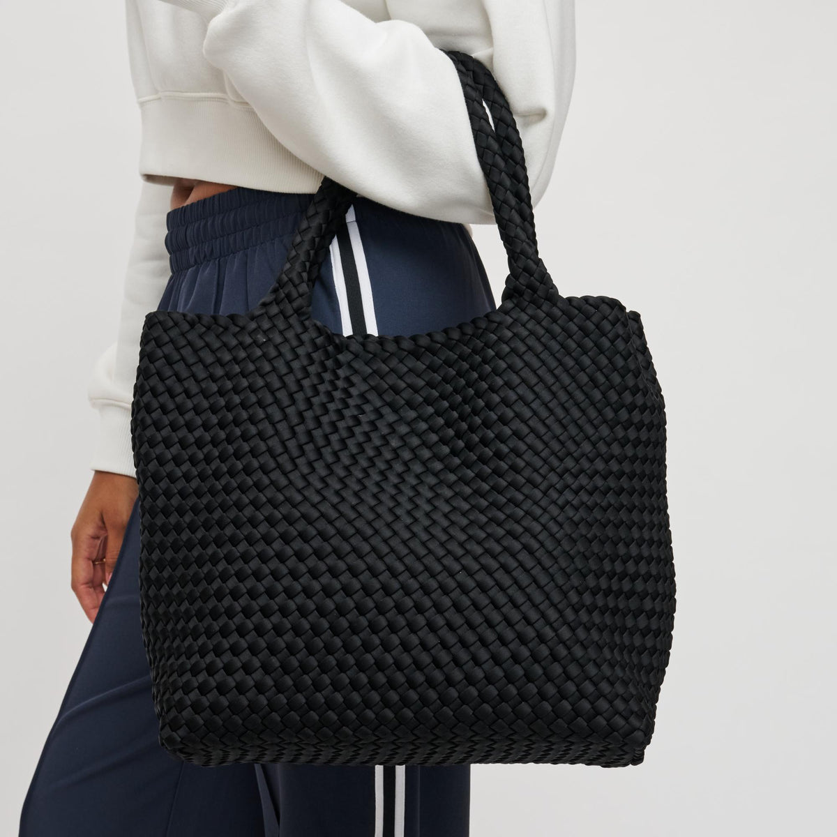 Woman wearing Black Sol and Selene Sky's The Limit - Medium Tote 841764107778 View 1 | Black
