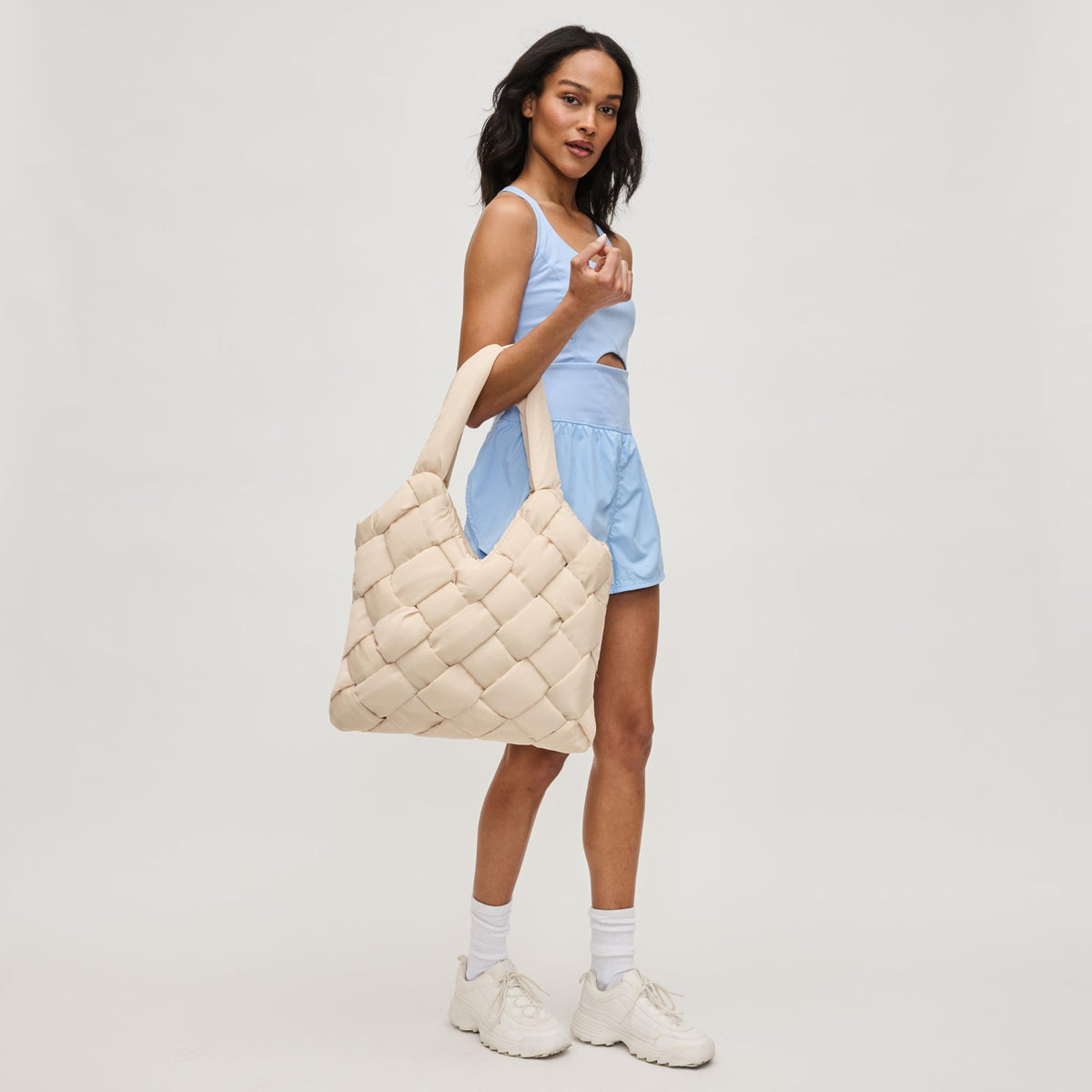 Woman wearing Cream Sol and Selene Illumine Tote 841764111911 View 2 | Cream