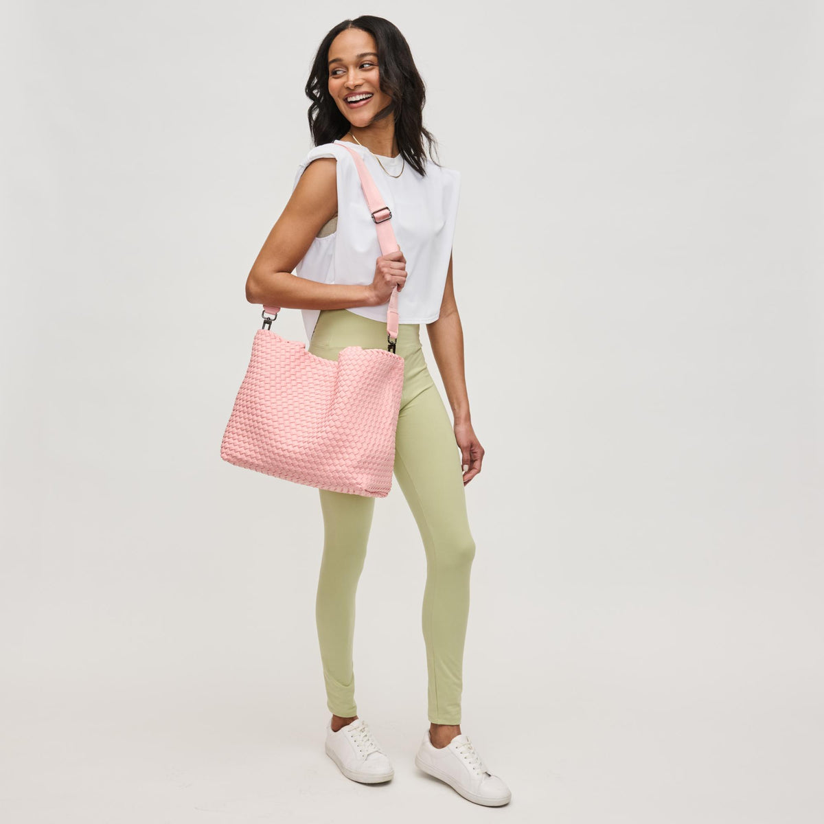 Woman wearing Blush Sol and Selene Sky's The Limit - Medium Tote 841764111270 View 2 | Blush