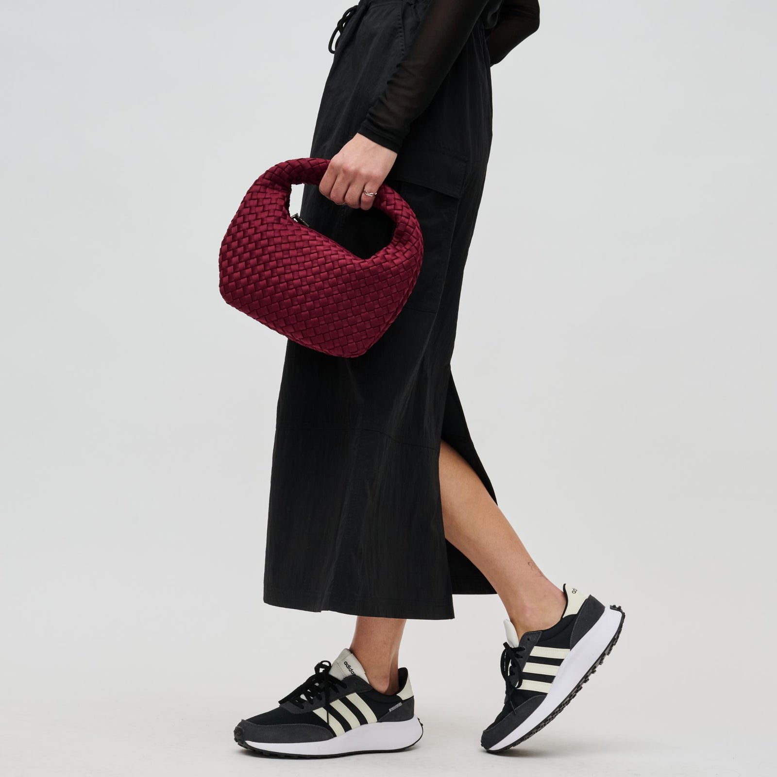 Woman wearing Black Sol and Selene Dare to Dream - Small Woven Neoprene Clutch 841764111072 View 1 | Black