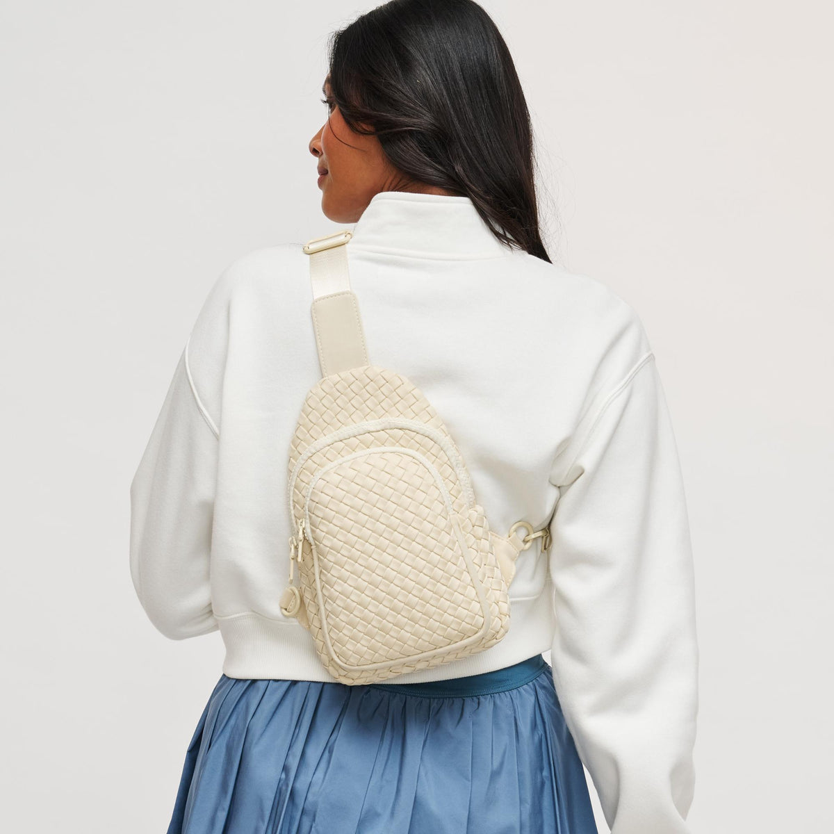Woman wearing Cream Sol and Selene Beyond The Horizon - Woven Neoprene Sling Backpack 841764109277 View 4 | Cream