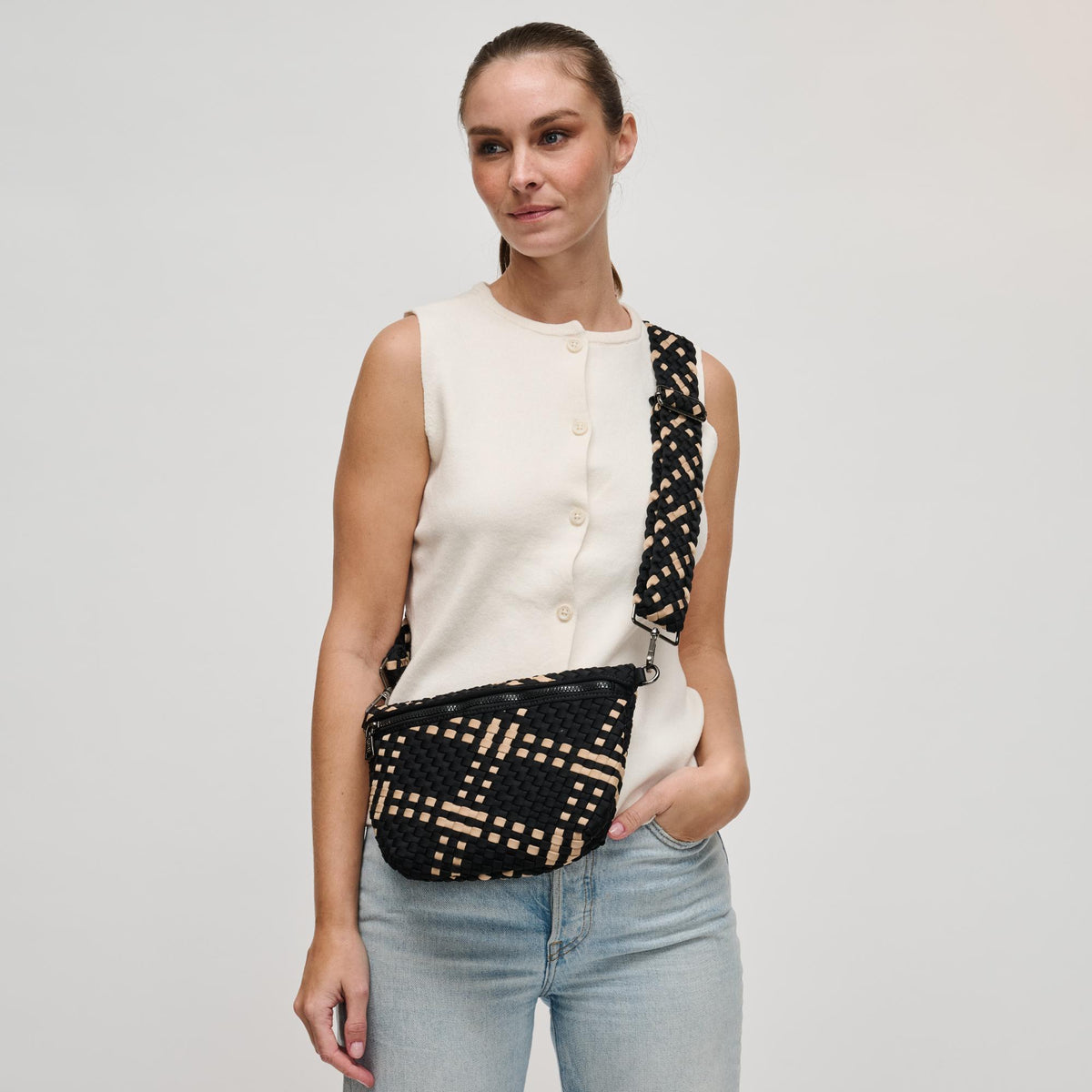 Woman wearing Black Nude Sol and Selene Ethereal - Woven Neoprene Crossbody 841764111768 View 2 | Black Nude