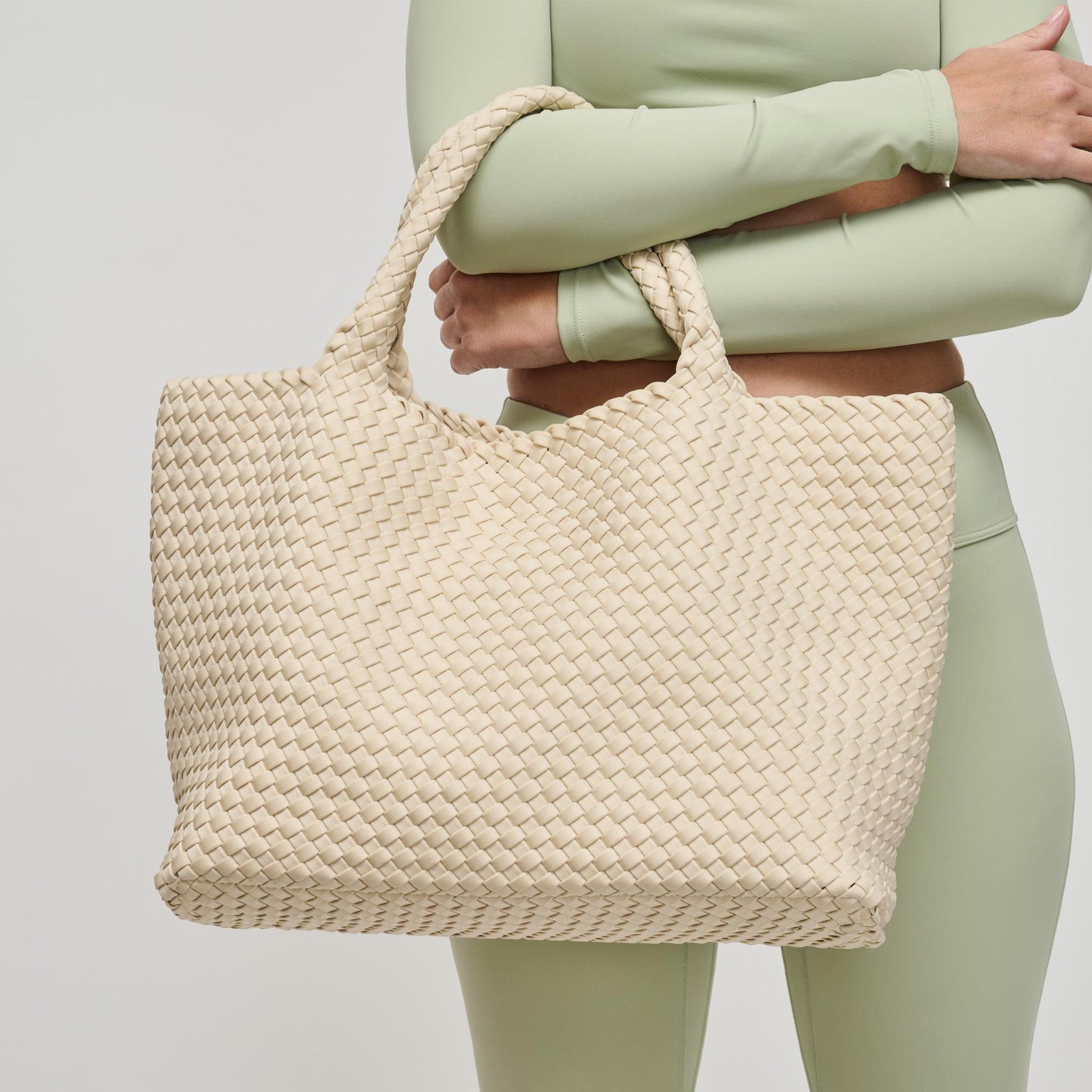 Woman wearing Nude Sol and Selene Sky's The Limit - Large Tote 841764107839 View 1 | Nude