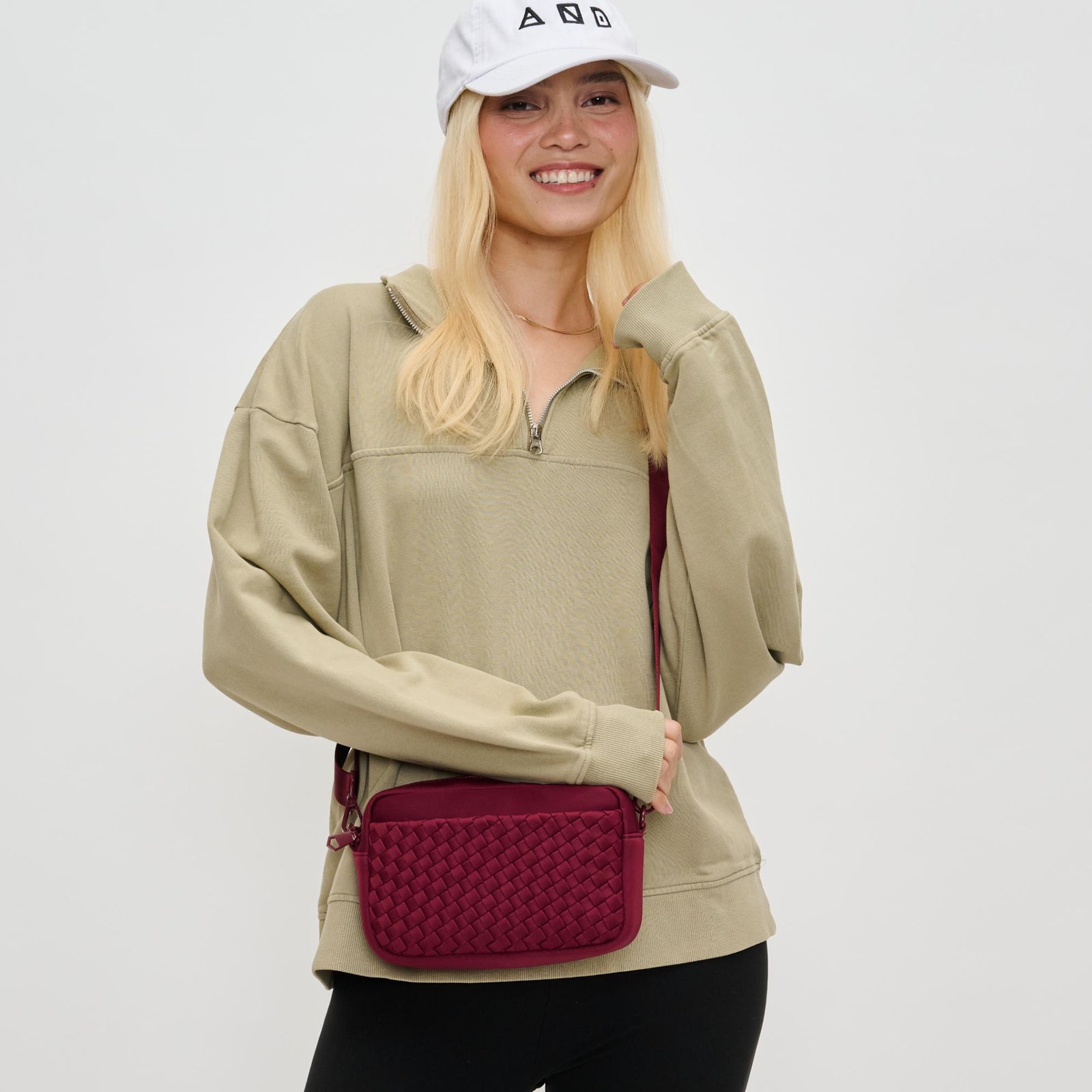 Woman wearing Black Sol and Selene Inspiration - Woven Neoprene Crossbody 841764108317 View 1 | Black