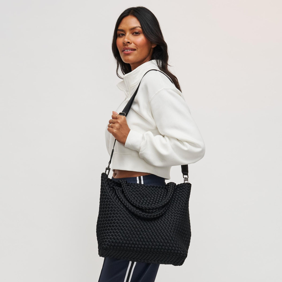 Woman wearing Black Sol and Selene Sky's The Limit - Medium Tote 841764107778 View 2 | Black
