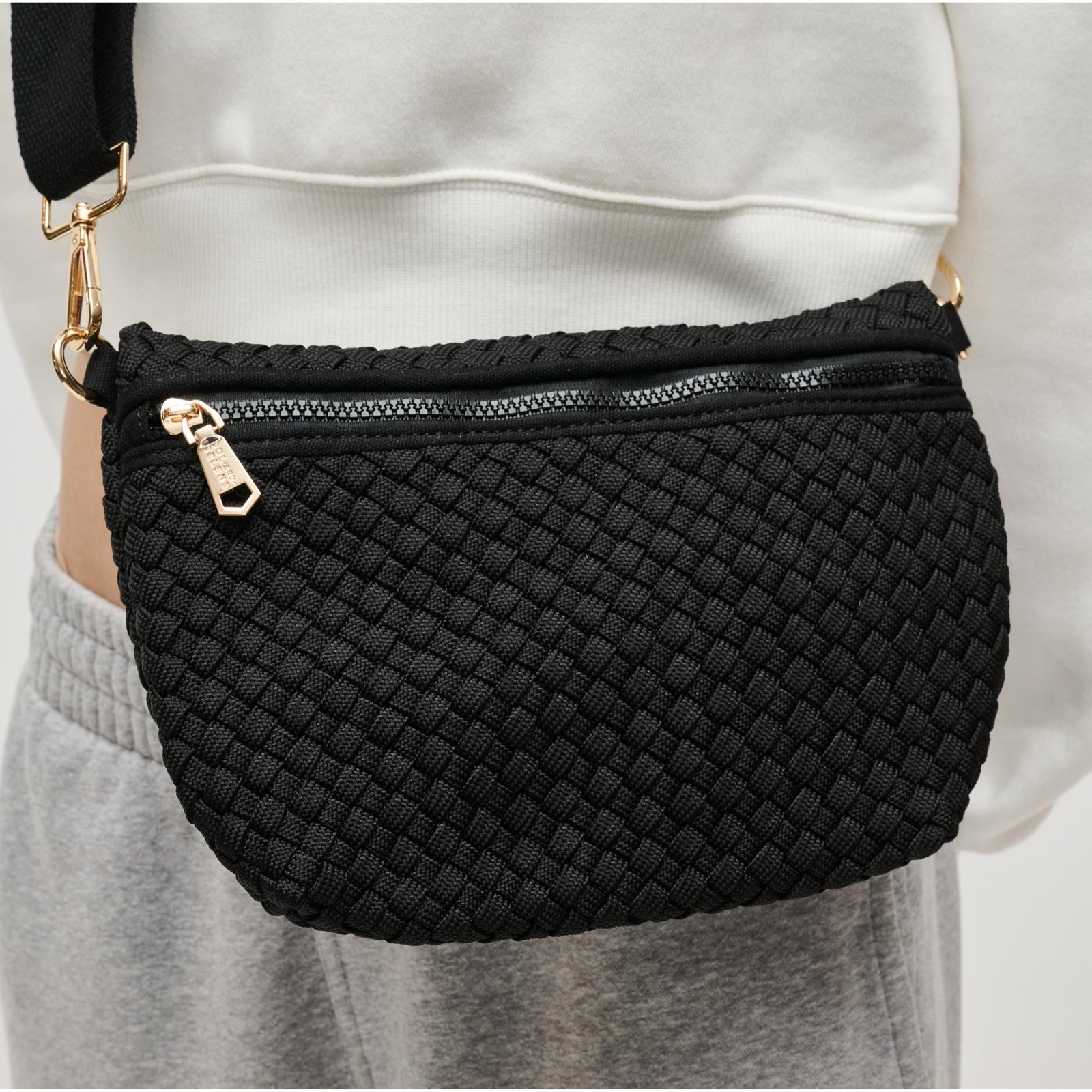 Woman wearing Black Sol and Selene Ethereal - Woven Laced Up Eco-Edition Crossbody 841764111539 View 1 | Black