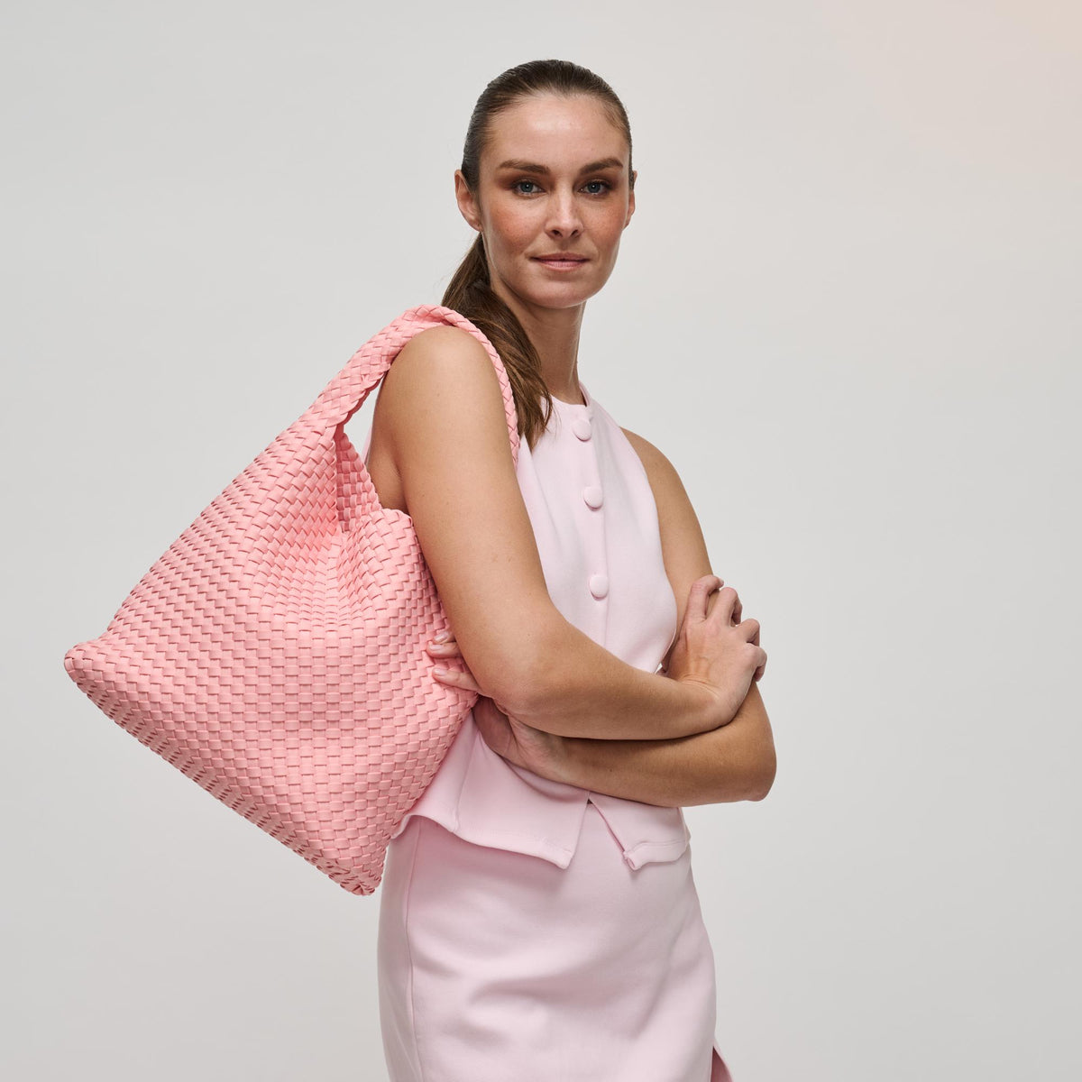 Woman wearing Blush Sol and Selene Celestial Woven Neoprene Hobo 841764112345 View 2 | Blush