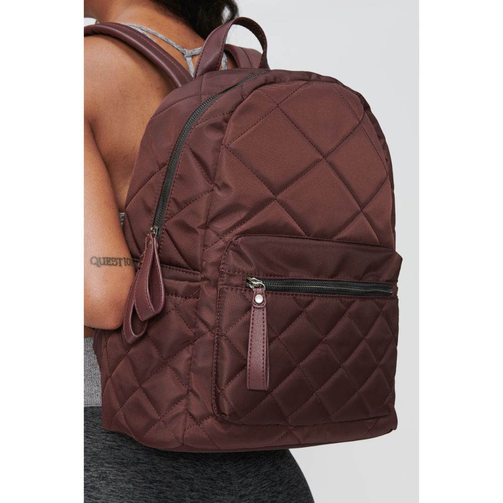Woman wearing Eggplant Sol and Selene Motivator - Medium Backpack 841764100090 View 2 | Eggplant