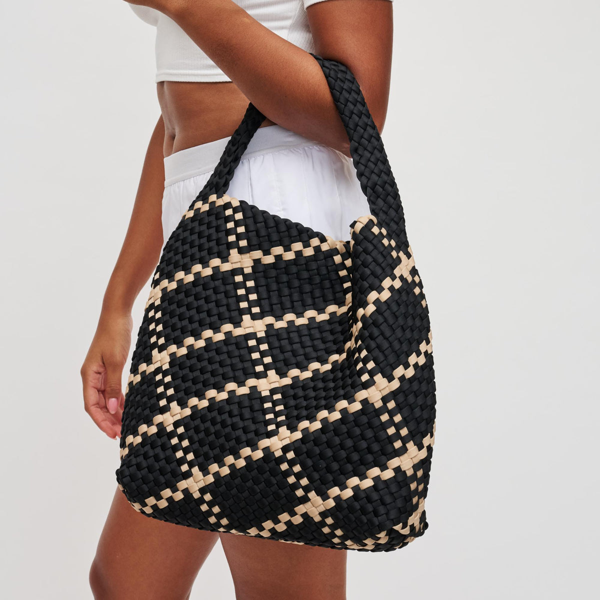 Woman wearing Black Nude Sol and Selene Celestial Woven Neoprene Hobo 841764112307 View 4 | Black Nude