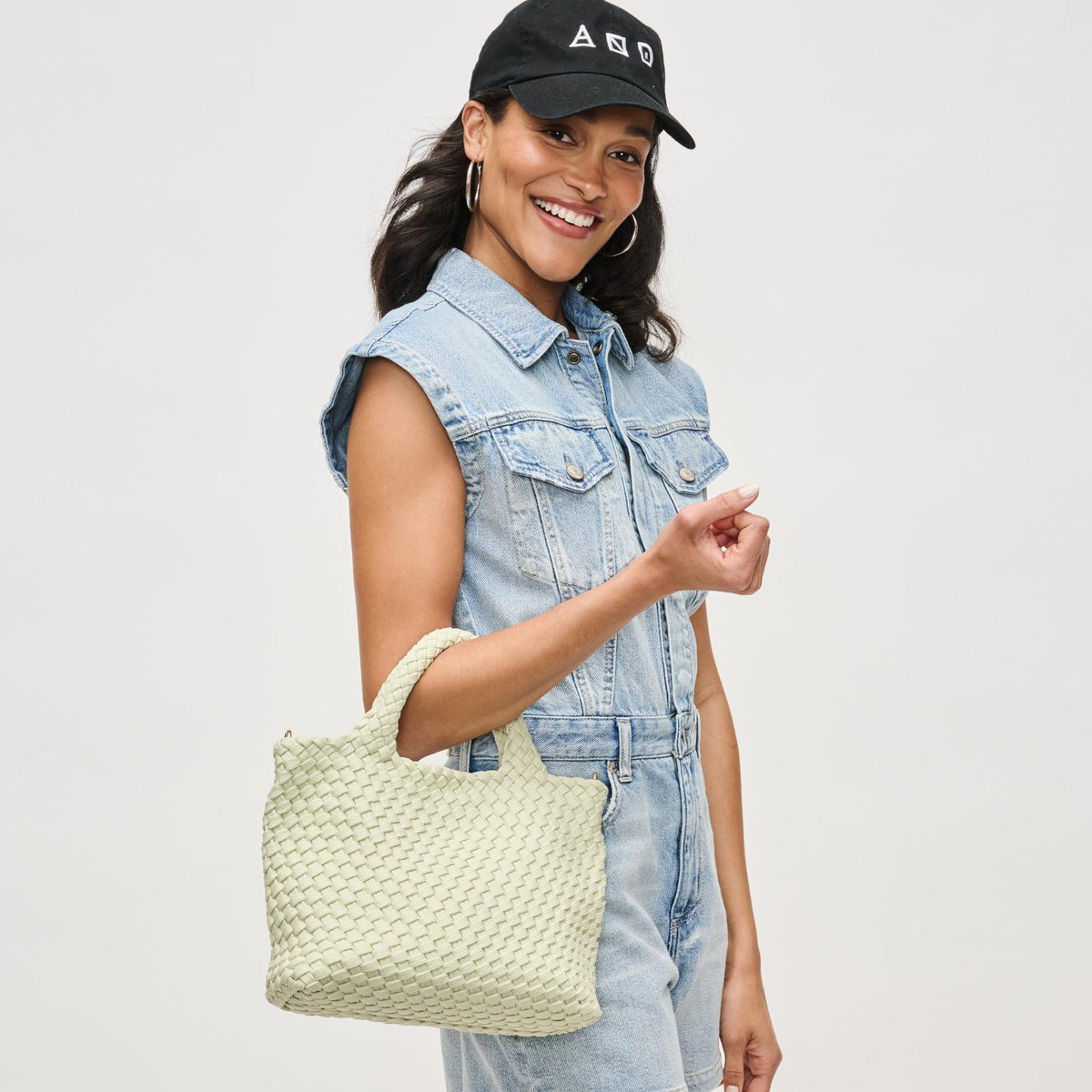 Woman wearing Pistachio Sol and Selene Sky's The Limit - Small Laced Up Eco-Edition Crossbody 841764111744 View 2 | Pistachio