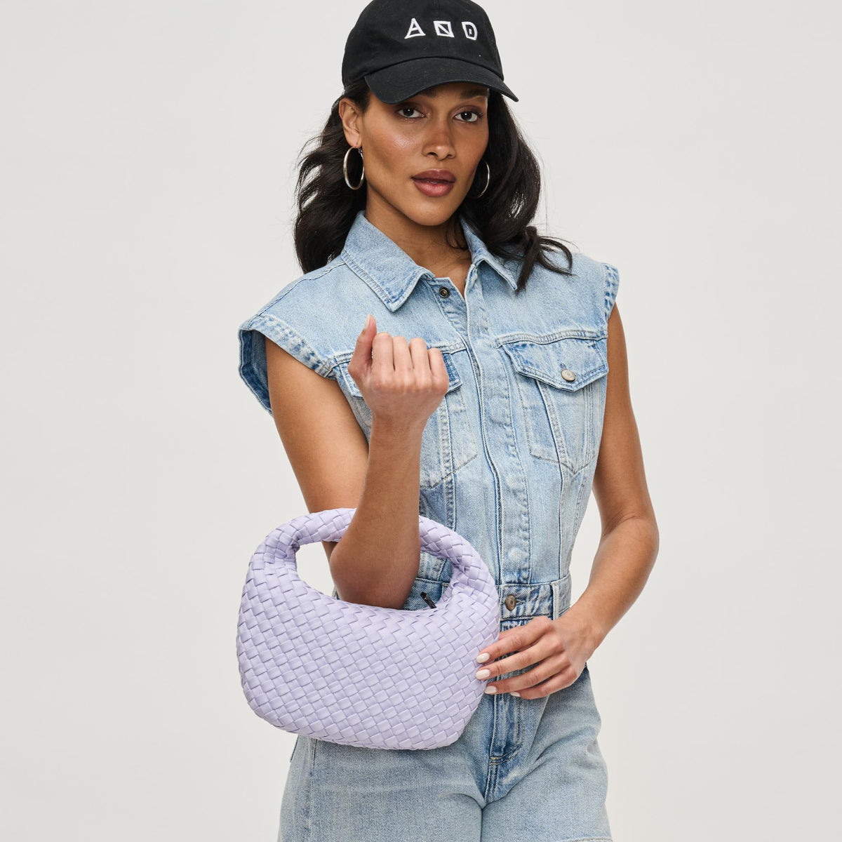 Woman wearing Lilac Sol and Selene Dare to Dream - Small Woven Neoprene Clutch 841764111515 View 2 | Lilac