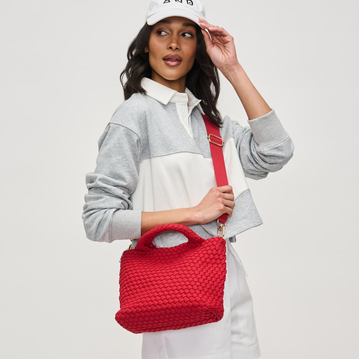 Woman wearing Red Sol and Selene Sky's The Limit - Small Laced Up Eco-Edition Crossbody 841764111751 View 3 | Red