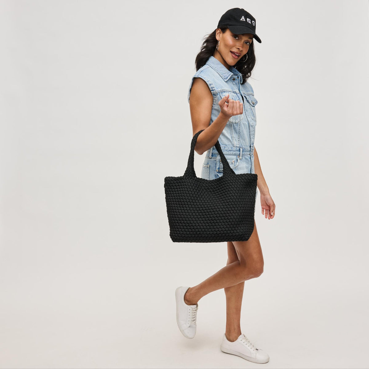 Woman wearing Black Sol and Selene Sky's The Limit - Medium Laced Up Eco-Edition Tote 841764111591 View 3 | Black