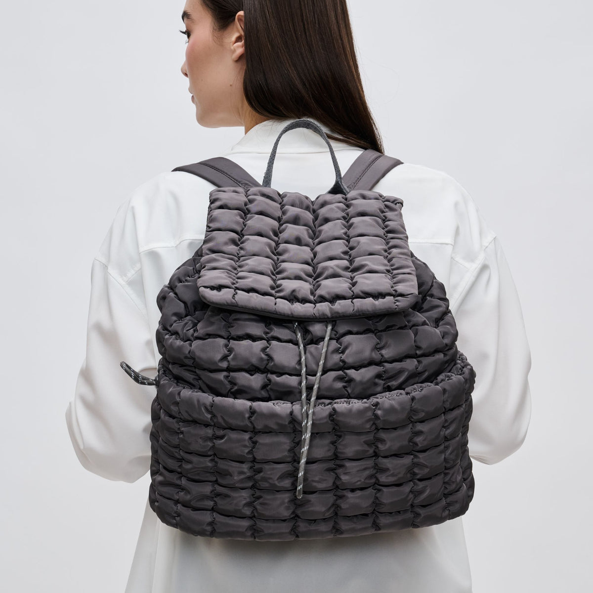 Woman wearing Carbon Sol and Selene Vitality Backpack 841764108508 View 1 | Carbon