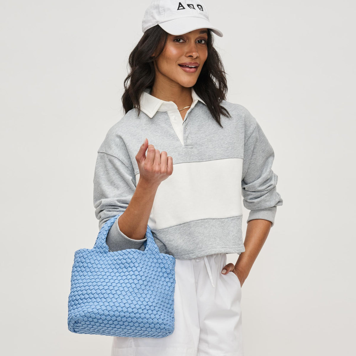 Woman wearing Azure Sol and Selene Sky's The Limit - Small Laced Up Eco-Edition Crossbody 841764111676 View 3 | Azure