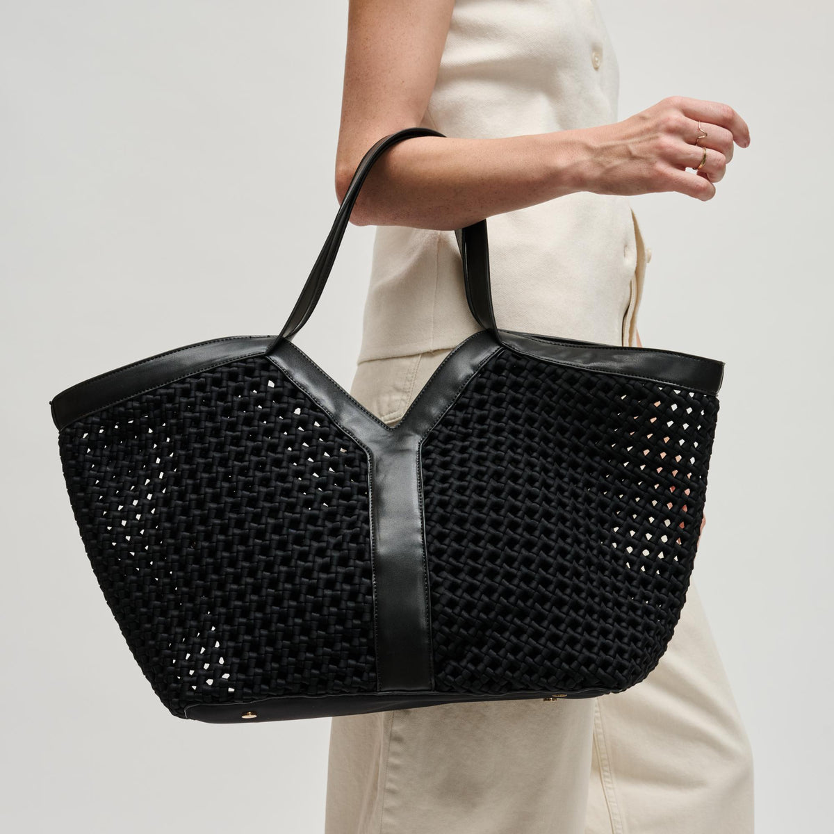 Woman wearing Black Sol and Selene Calypso Tote 841764112901 View 2 | Black