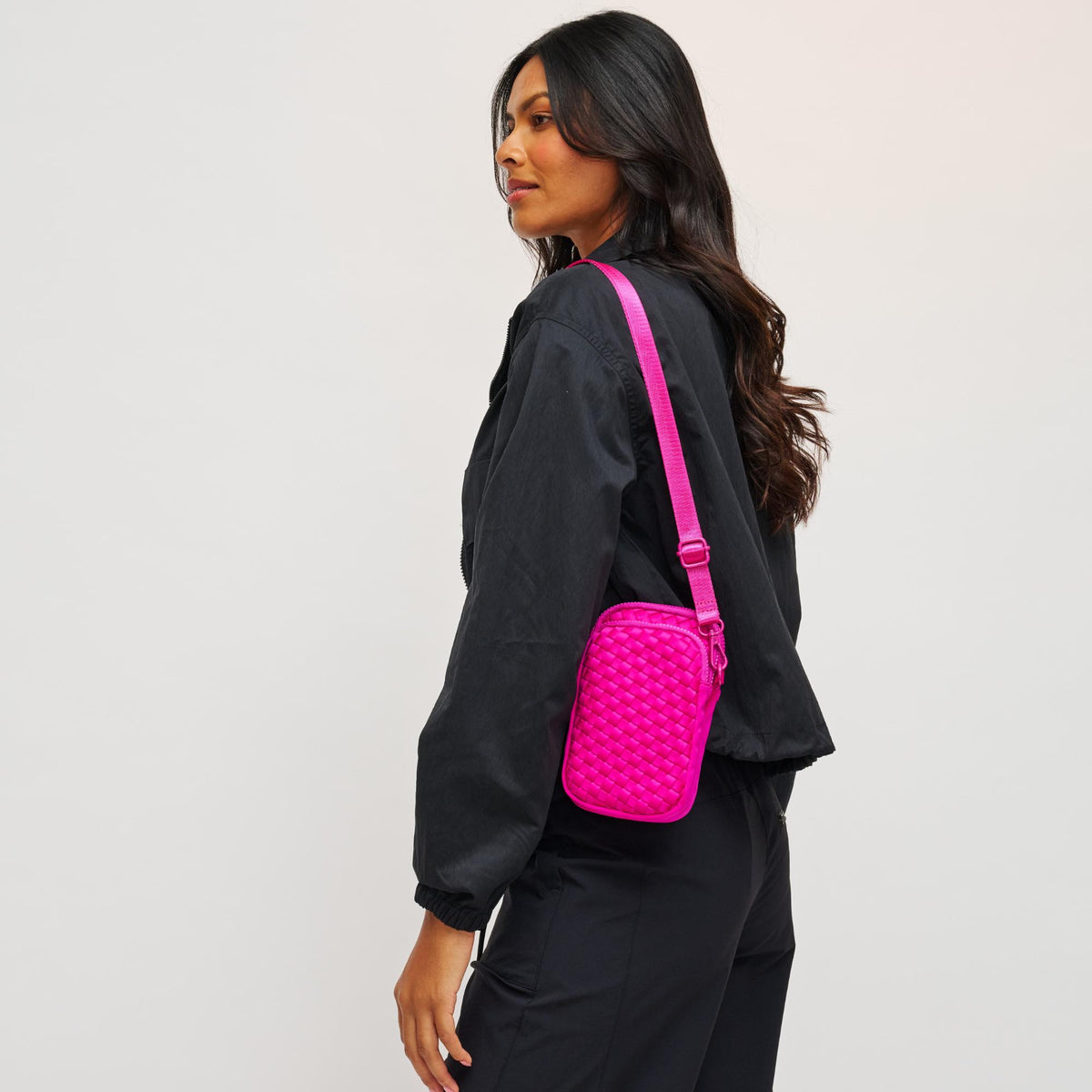 Woman wearing Fuchsia Sol and Selene Divide & Conquer - Woven Neoprene Crossbody 841764108720 View 3 | Fuchsia