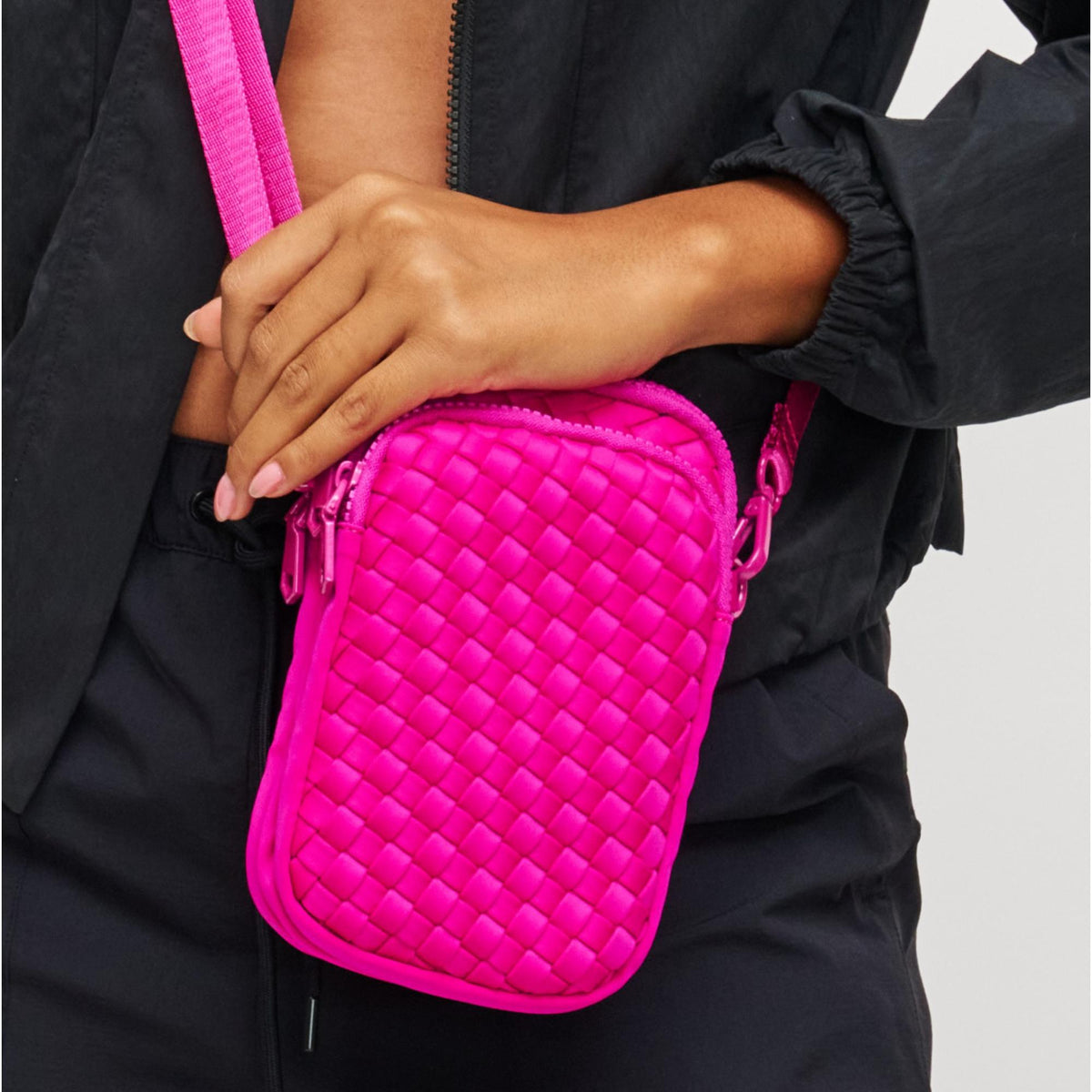 Woman wearing Fuchsia Sol and Selene Divide & Conquer - Woven Neoprene Crossbody 841764108720 View 4 | Fuchsia