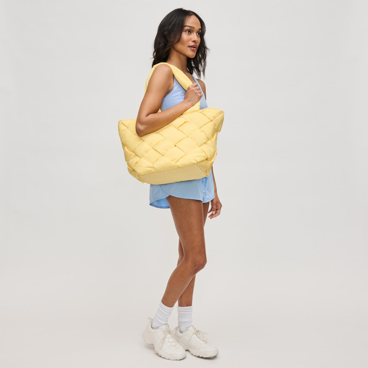 Woman wearing Butter Sol and Selene Intuition East West Tote 841764111836 View 3 | Butter