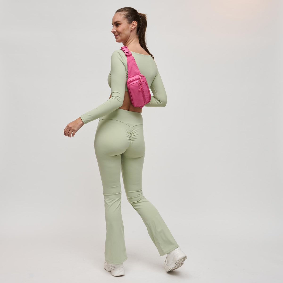 Woman wearing Mauve Sol and Selene Hip Hugger Belt Bag 841764108294 View 3 | Mauve