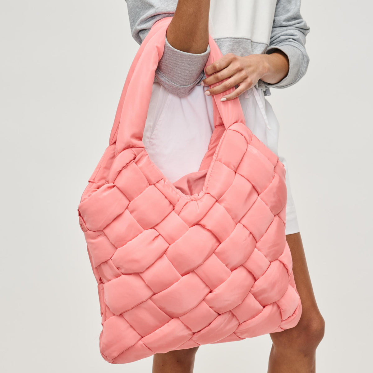 Woman wearing Salmon Sol and Selene Illumine Tote 841764111935 View 4 | Salmon