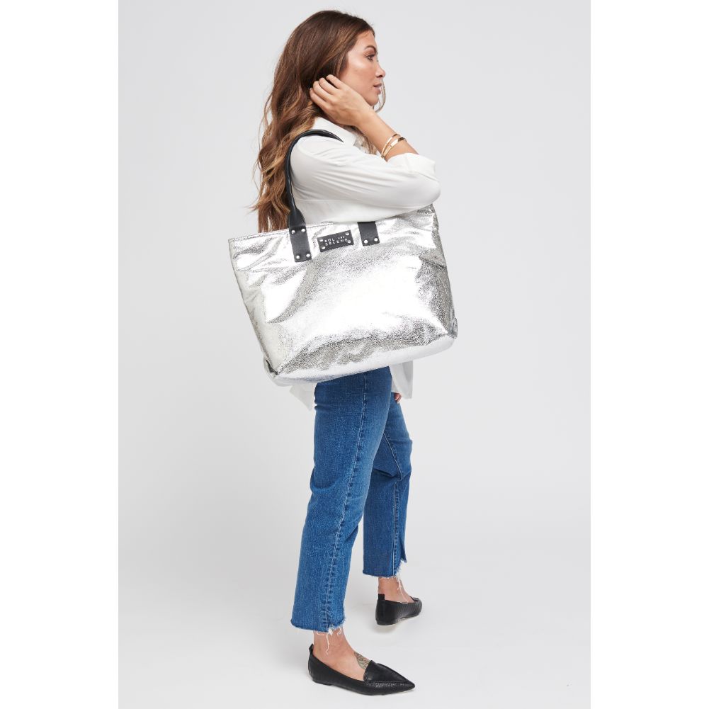 Woman wearing Silver Metallic Sol and Selene It Girl Tote 841764105095 View 3 | Silver Metallic