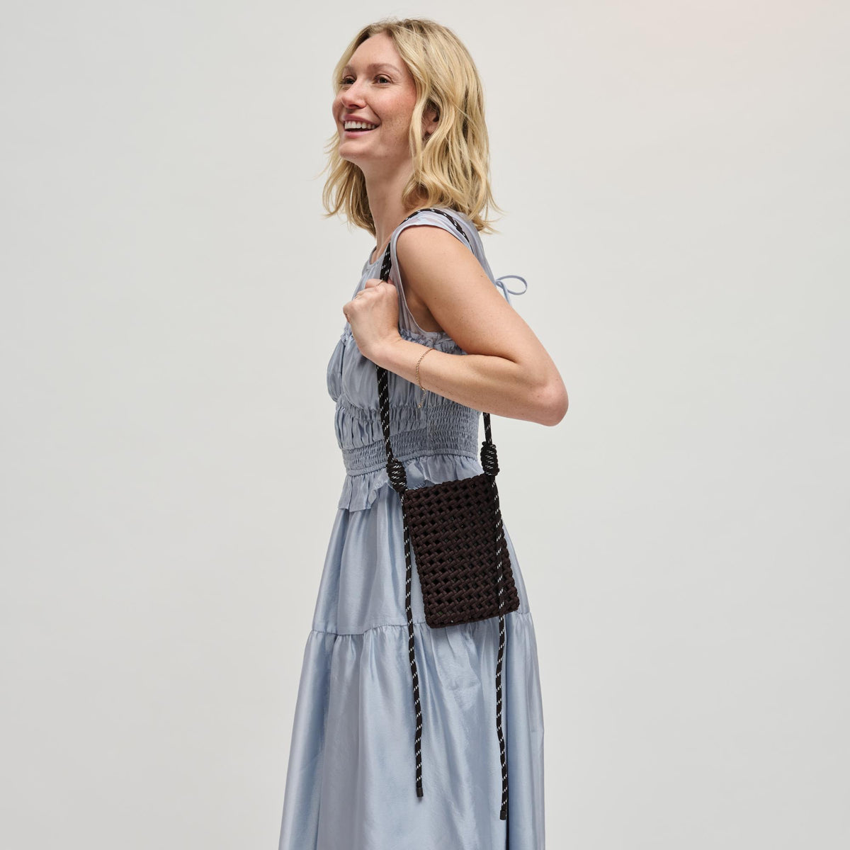 Woman wearing Chocolate Sol and Selene Eos Cell Phone Crossbody 841764113038 View 3 | Chocolate