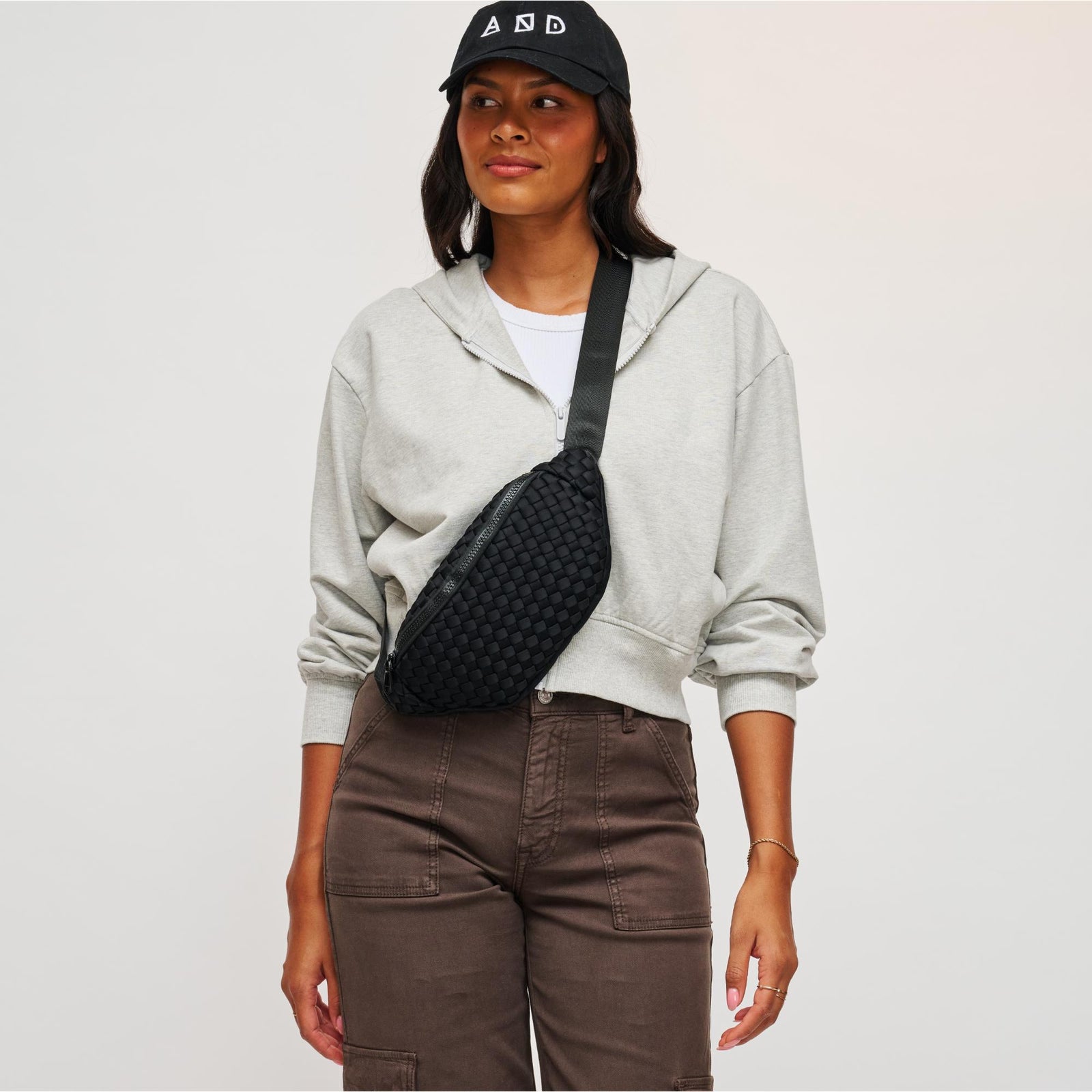 Woman wearing Black Sol and Selene Aim High Belt Bag 841764108102 View 1 | Black