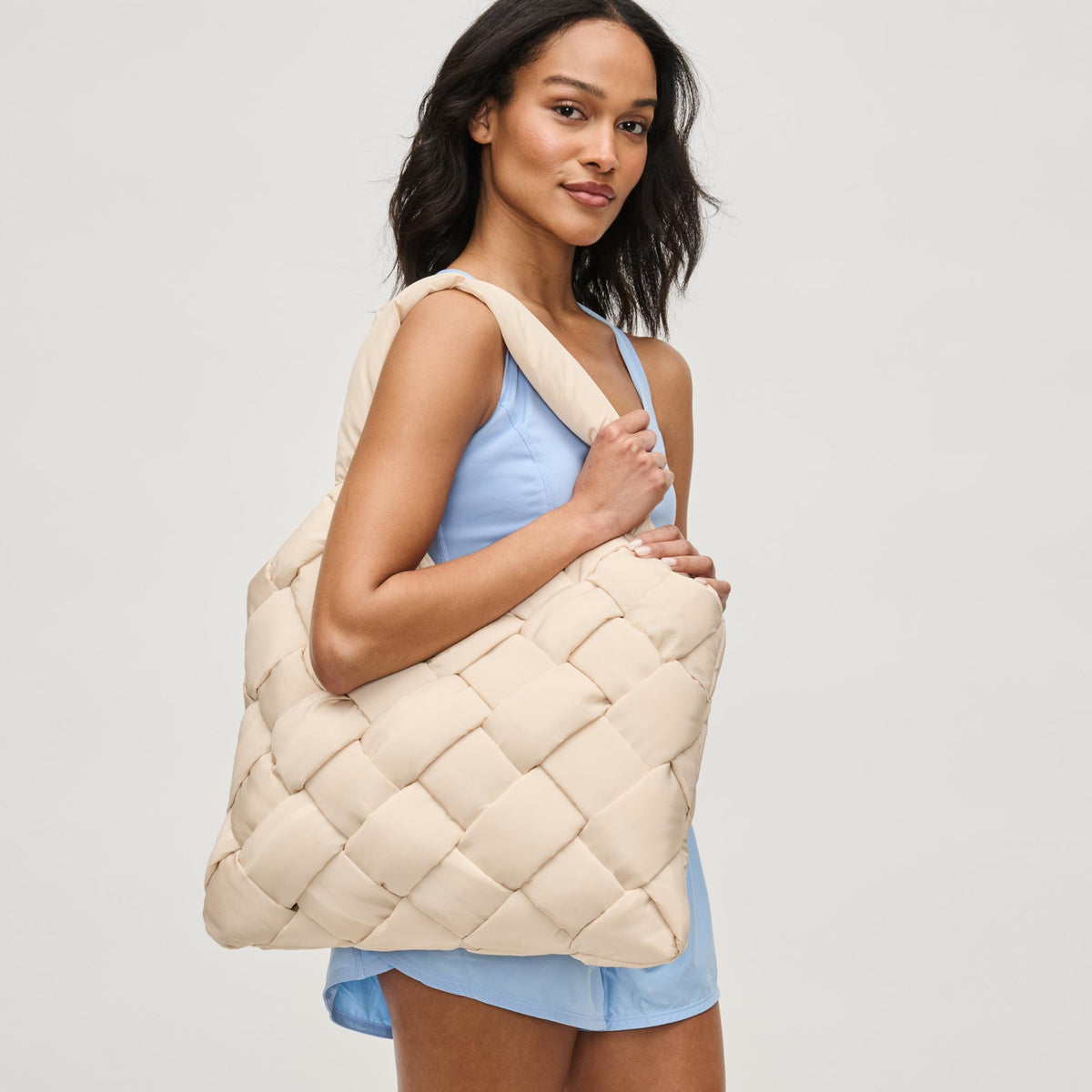 Woman wearing Cream Sol and Selene Illumine Tote 841764111911 View 1 | Cream