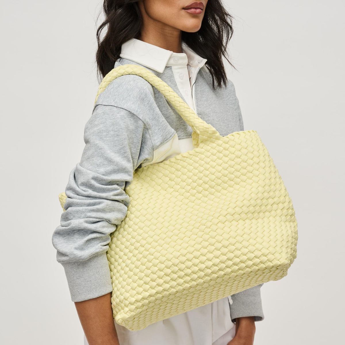 Woman wearing Butter Sol and Selene Sky's The Limit - Medium Tote 841764111287 View 4 | Butter