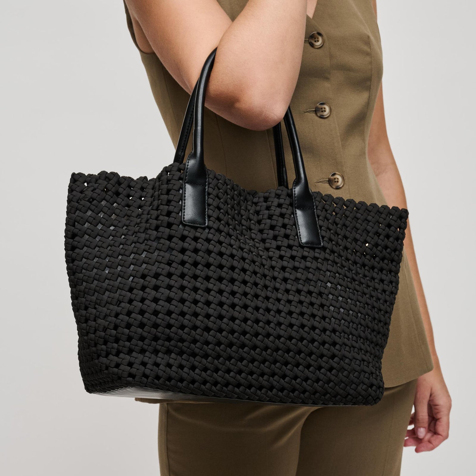 Woman wearing Black Sol and Selene Solstice - Medium Tote 841764109932 View 1 | Black