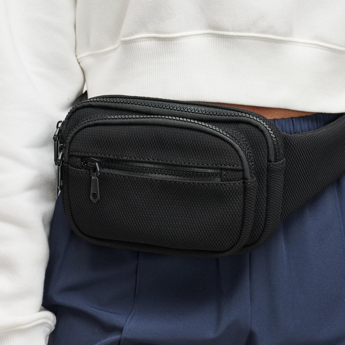 Woman wearing Black Sol and Selene Hip Hugger - Neoprene Mesh Belt Bag 841764109819 View 3 | Black