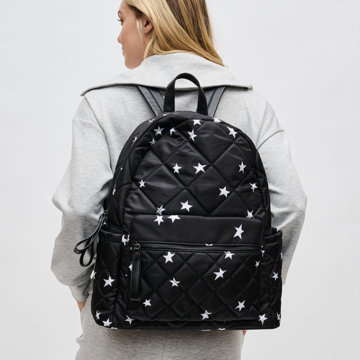 Woman wearing Black Star Sol and Selene Motivator - Large Travel Backpack 841764107426 View 1 | Black Star