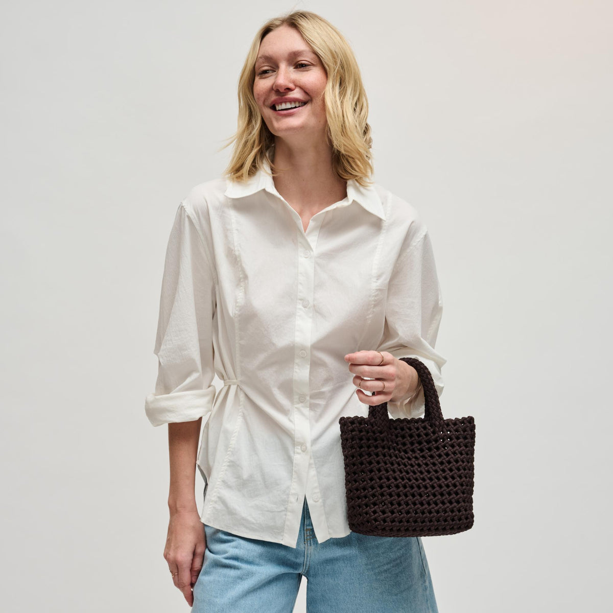 Woman wearing Chocolate Sol and Selene Ambrosia Small Crossbody 841764112697 View 4 | Chocolate