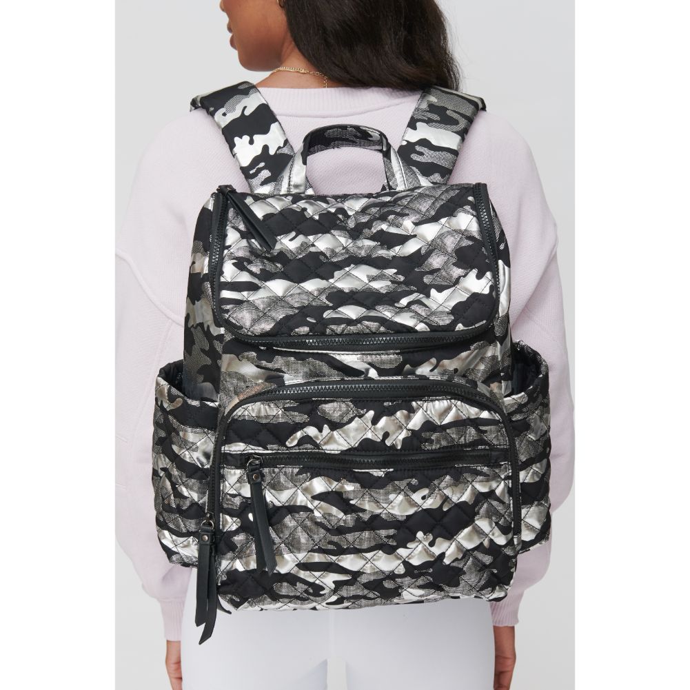 Woman wearing Silver Metallic Camo Sol and Selene Destination Backpack 841764104395 View 2 | Silver Metallic Camo