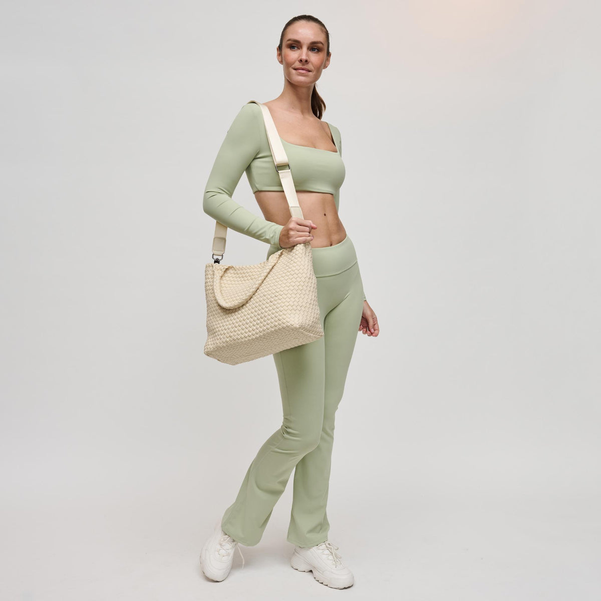 Woman wearing Cream Sol and Selene Sky's The Limit - Medium Tote 841764109246 View 3 | Cream