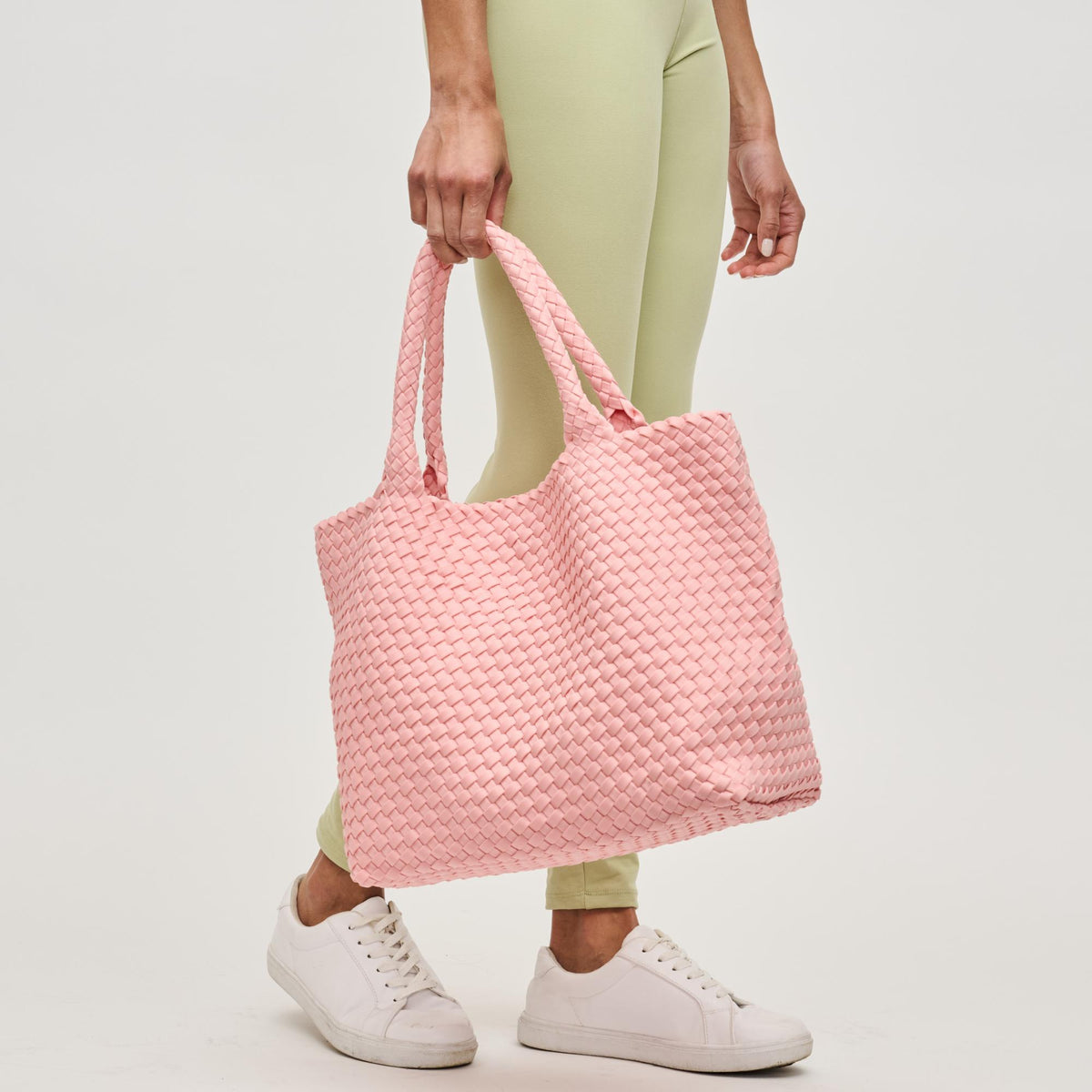 Woman wearing Blush Sol and Selene Sky's The Limit - Medium Tote 841764111270 View 4 | Blush
