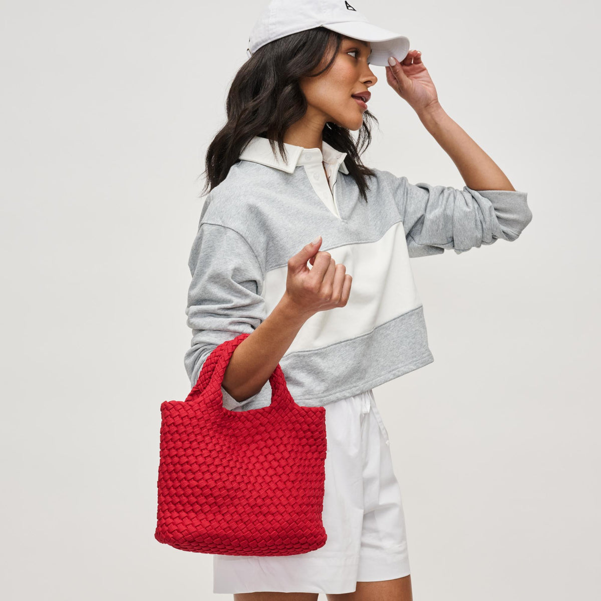 Woman wearing Red Sol and Selene Sky's The Limit - Small Laced Up Eco-Edition Crossbody 841764111751 View 2 | Red