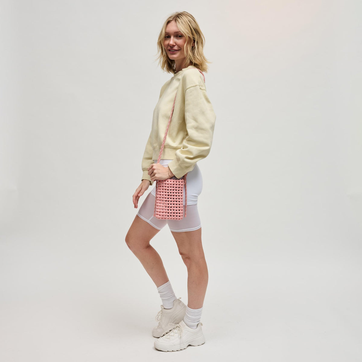 Woman wearing Blush Sol and Selene Eos Cell Phone Crossbody 841764113021 View 4 | Blush