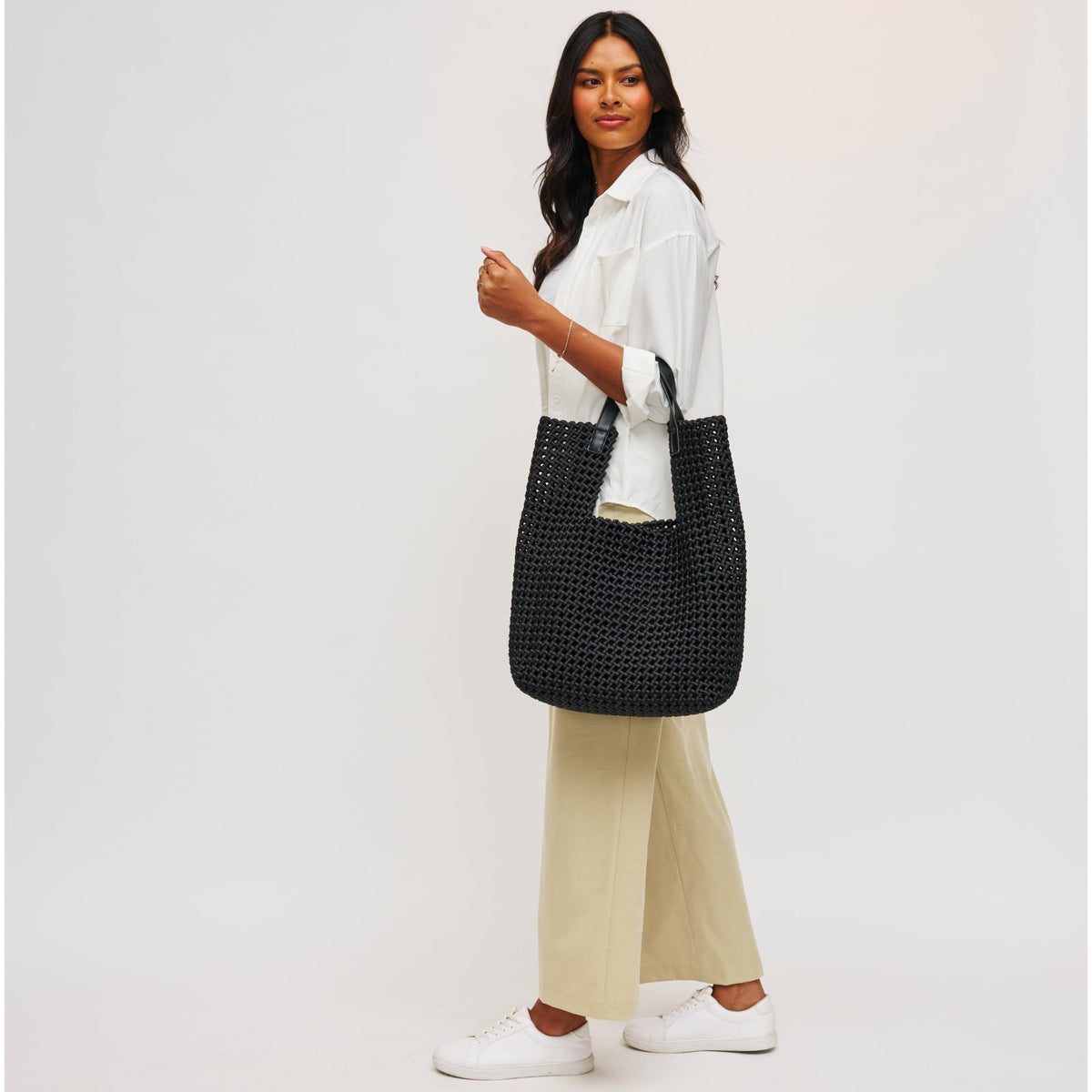 Woman wearing Black Sol and Selene Zenith Zen Tote 841764109970 View 3 | Black