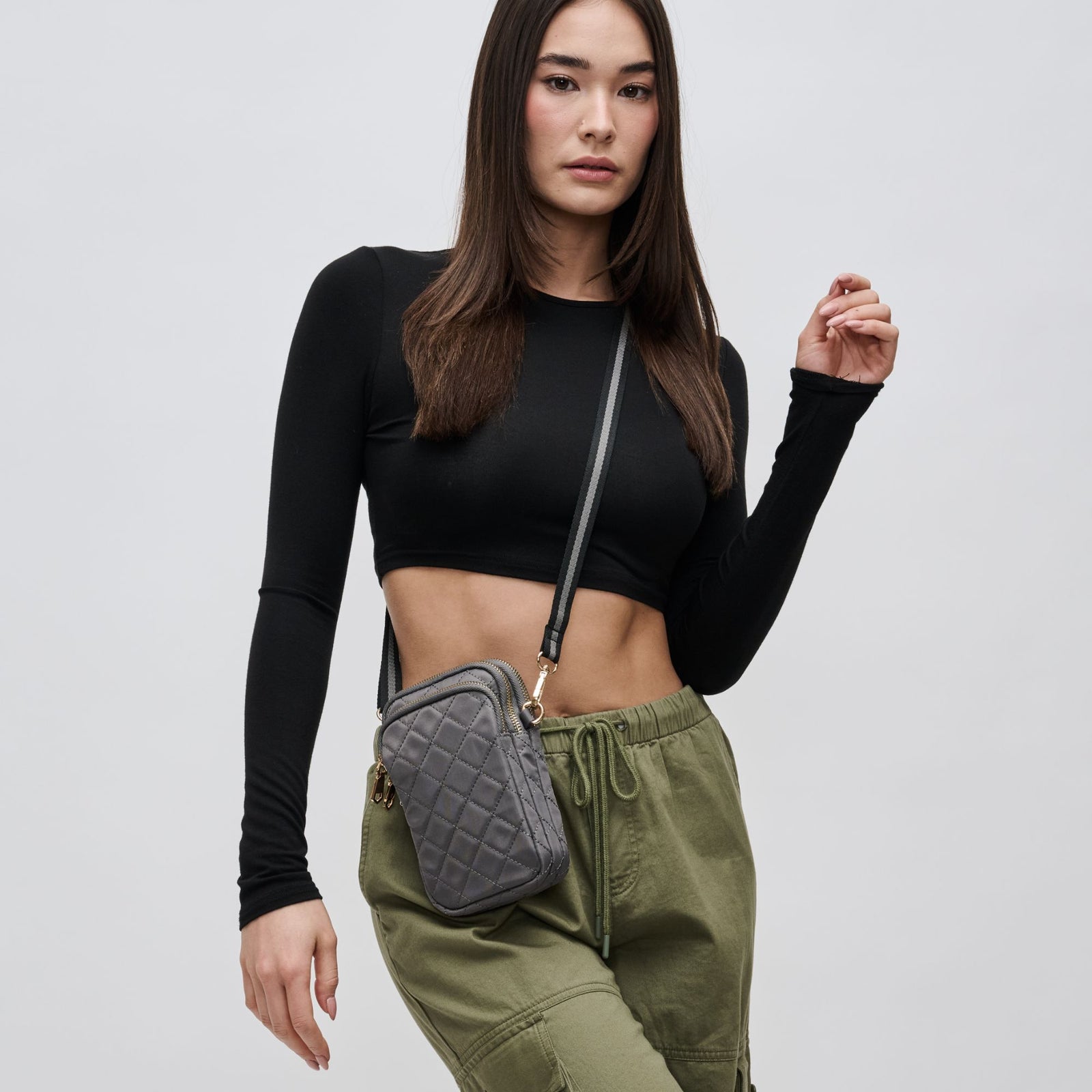 Woman wearing Black Sol and Selene Divide & Conquer - Quilted Crossbody 841764107440 View 1 | Black