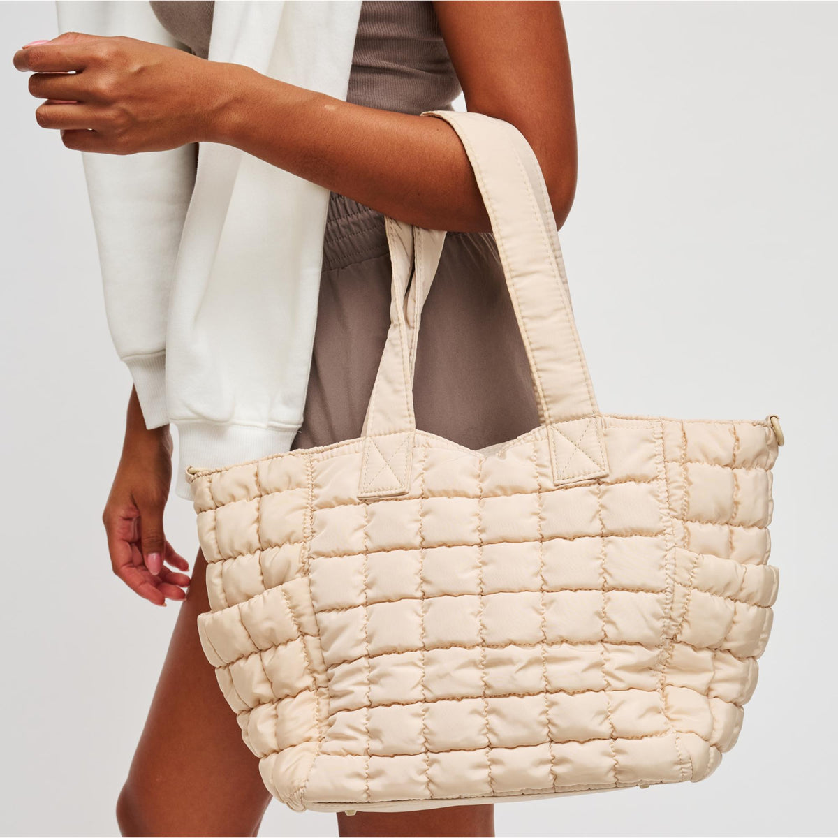 Woman wearing Cream Sol and Selene Dreamer Tote 841764109451 View 1 | Cream