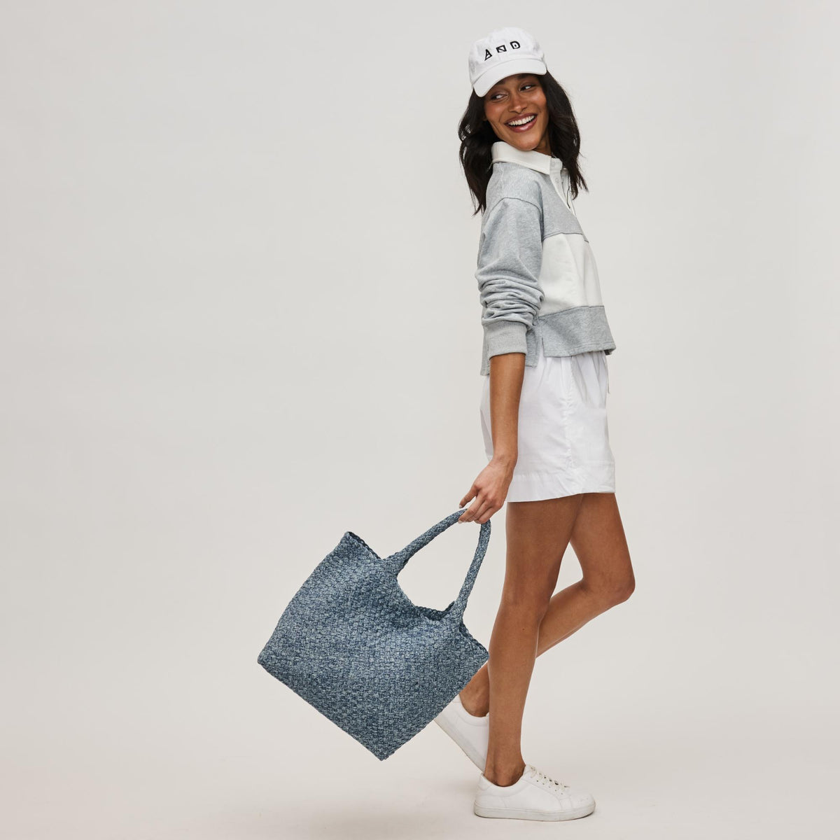 Woman wearing Denim Sol and Selene Sky's The Limit - Medium Denim Tote 841764111294 View 2 | Denim
