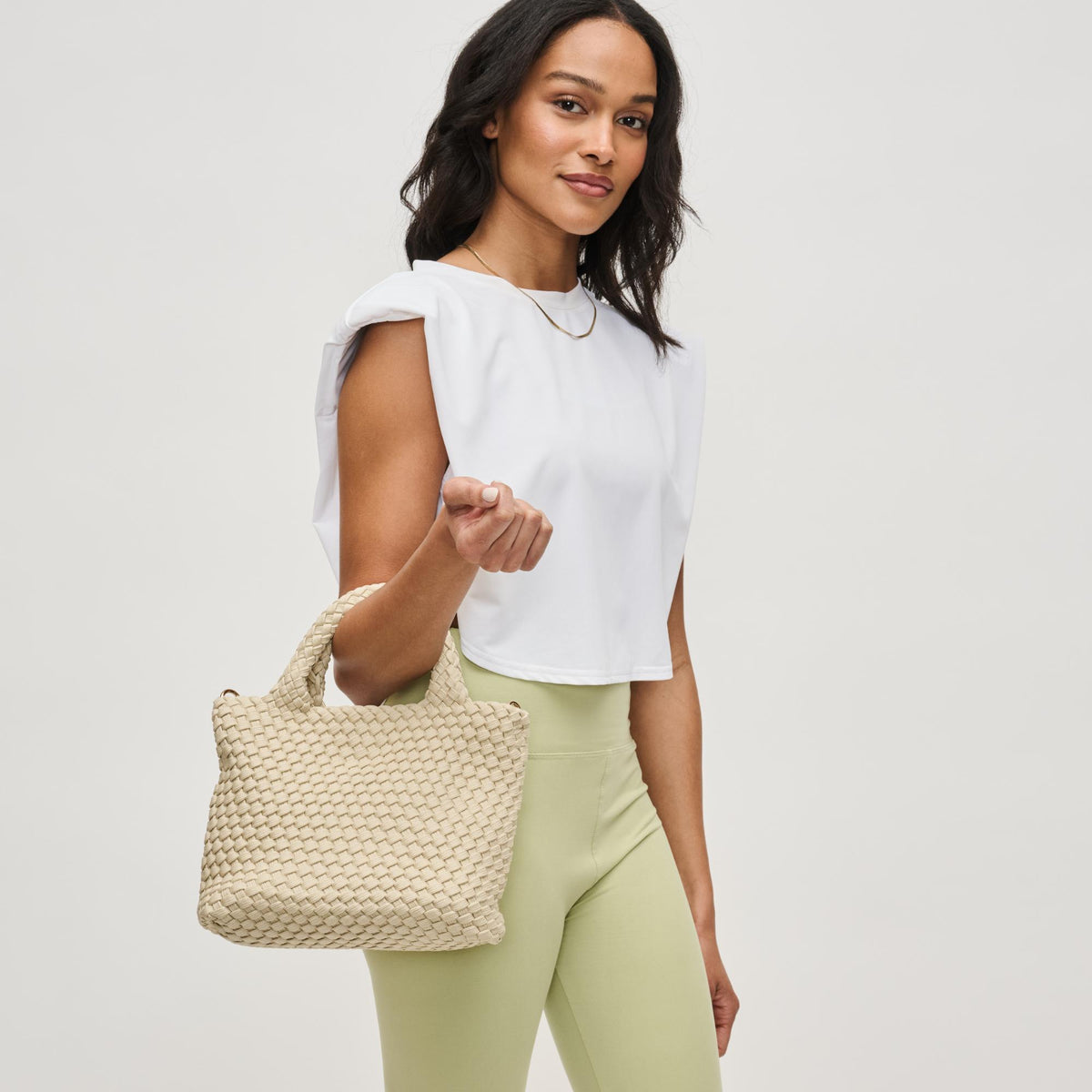 Woman wearing Beige Sol and Selene Sky's The Limit - Small Laced Up Eco-Edition Crossbody 841764111683 View 2 | Beige