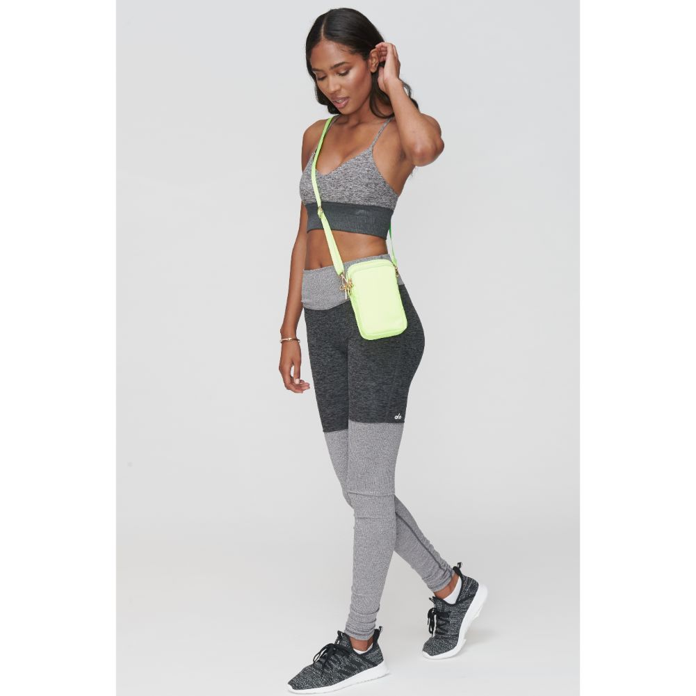 Woman wearing Neon Yellow Sol and Selene Divide & Conquer Crossbody 841764104739 View 1 | Neon Yellow